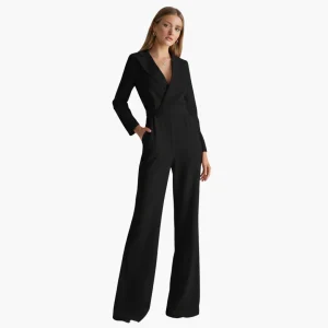 Kvinnors jumpsuit med skjortkrage och vida ben