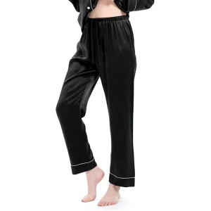 Kvinnors svarta sidenpyjamasbyxor med vita rörledningar